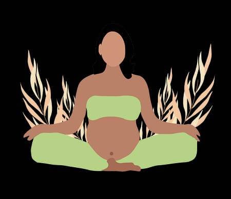 A pregnant woman meditating